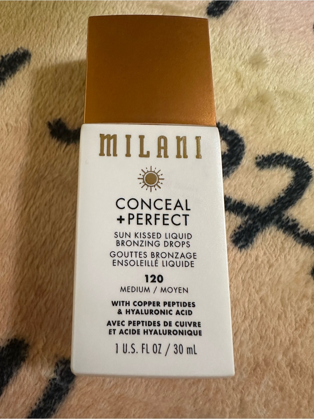Milani White and Gold Conceal + Perfect Sun Kissed Liquid Bronzing Drops
